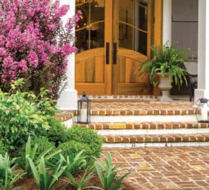 Delta Fusion Crapemyrtles frame an entryway to brick home
