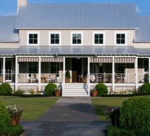 Southern Living Idea House with large front porch and metal roof