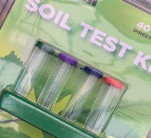 Store bought soil test in the package with 4 plastic tubes with different colored lids