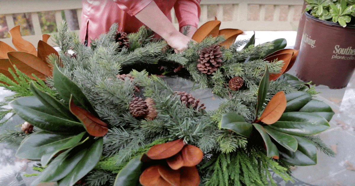 Carmen wreath with short pine needles and green and brown foliage